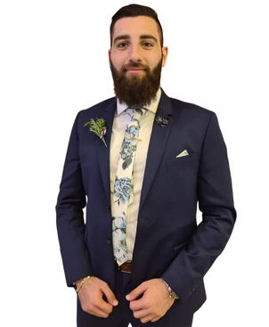 Passport-style portrait of Joseph Zalloua, board member, wearing professional attire and smiling confidently.