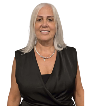 Portrait of Laudy Farah Ayoub, board member, wearing professional attire and smiling in a passport-style photo.